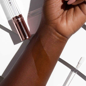 Anastasia Beverly Hills label close-up highlighting formula details and benefits