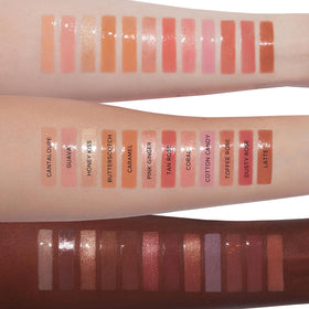 Anastasia Beverly Hills gloss tucked in a makeup bag for everyday polished looks