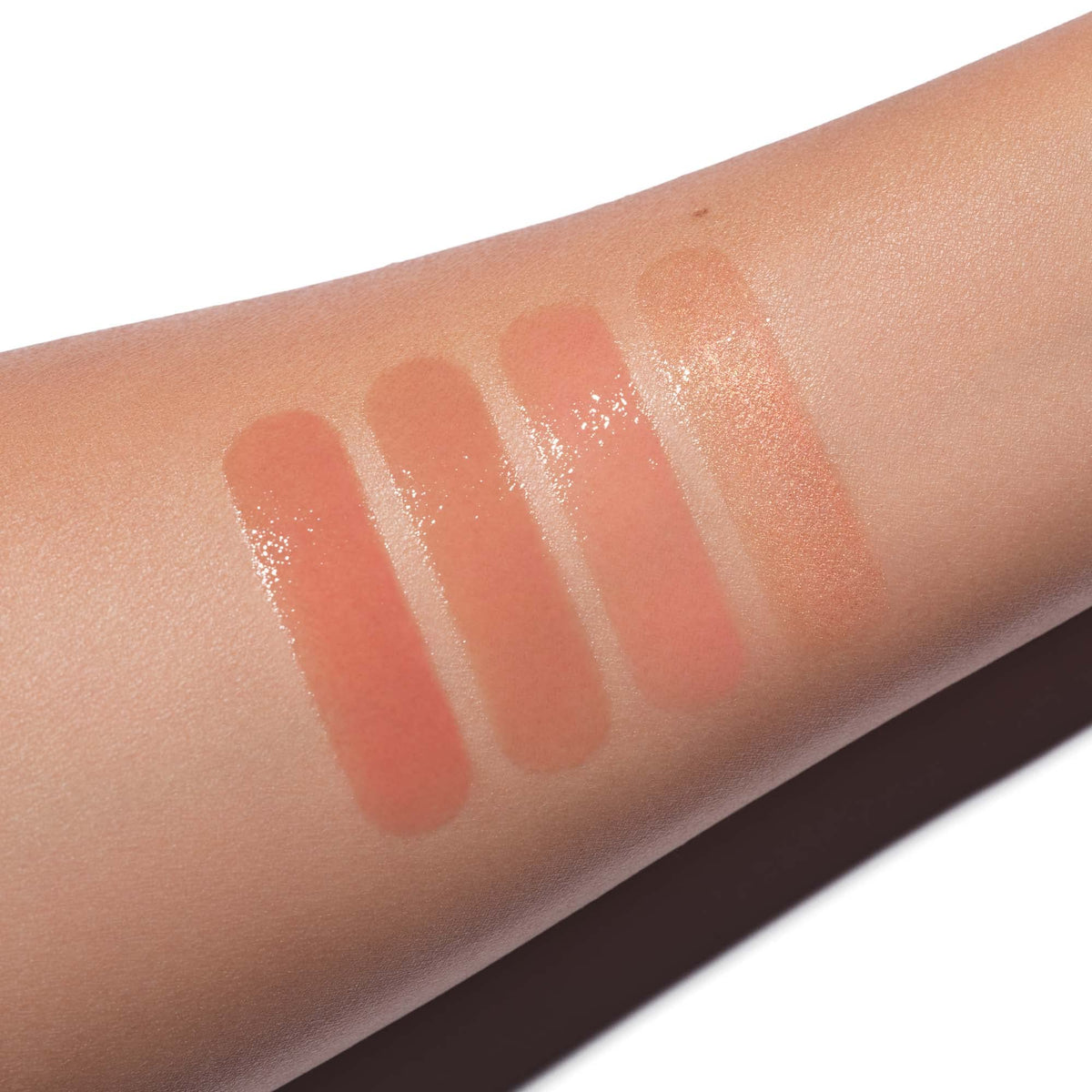 Anastasia Beverly Hills Sun Baked on model smile illustrating fuller-looking lips