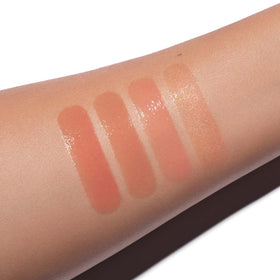 Anastasia Beverly Hills Sun Baked on model smile illustrating fuller-looking lips