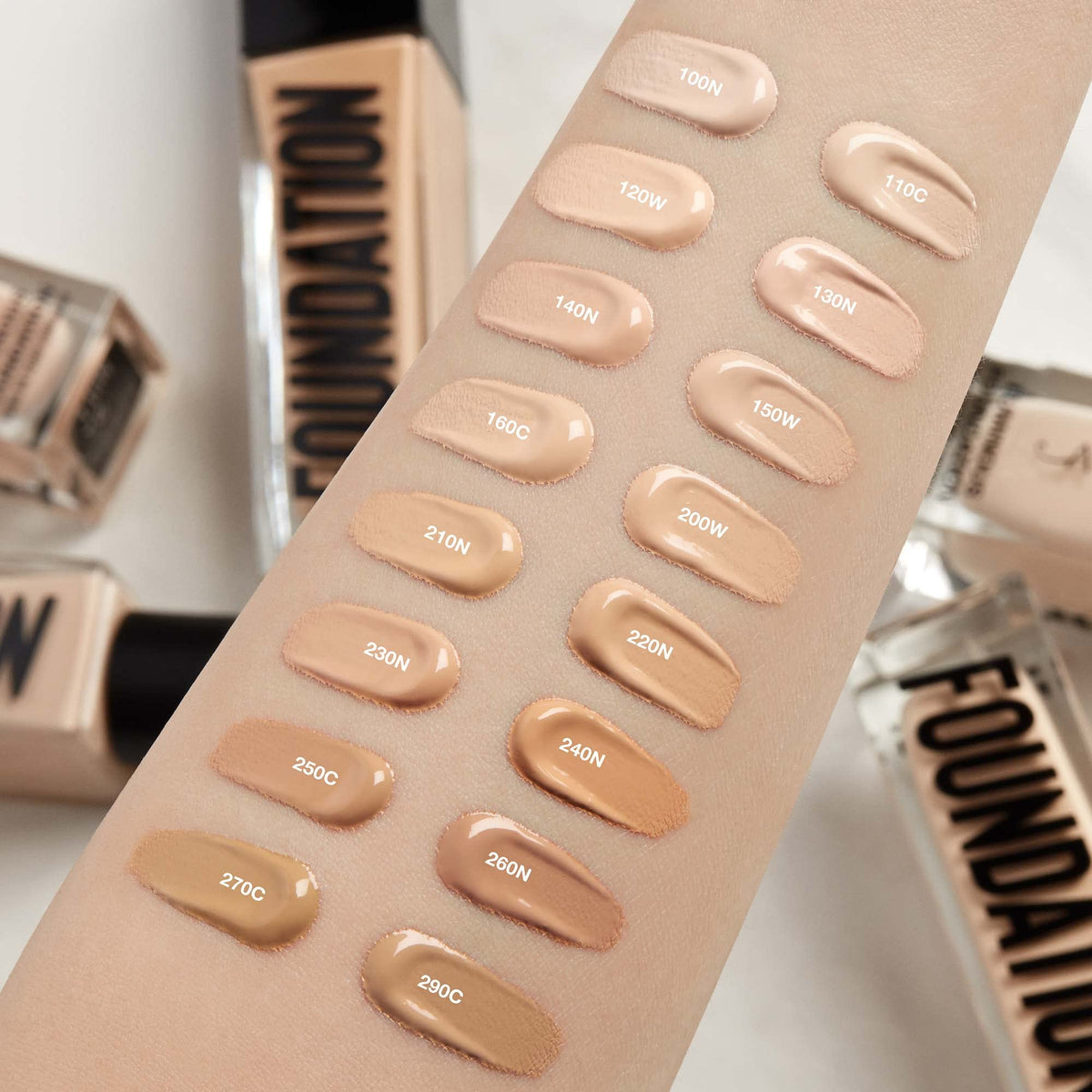 Anastasia Beverly Hills foundation being dispensed onto a spatula for hygienic application