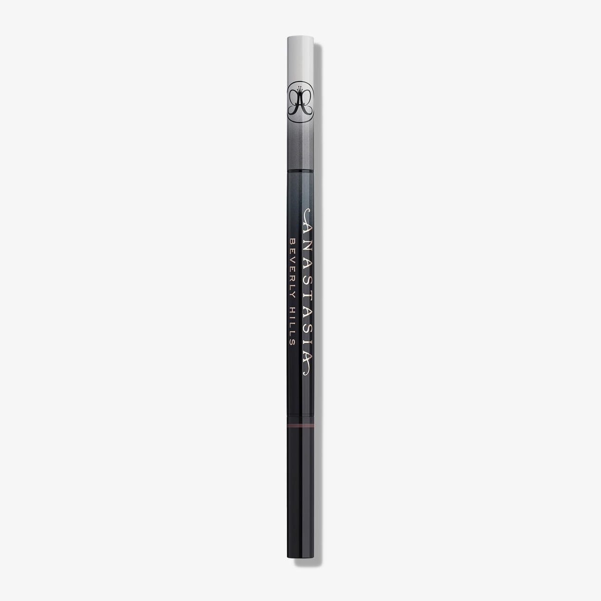 Anastasia Beverly Hills pen placed with bag and mirror for on-the-go touchups