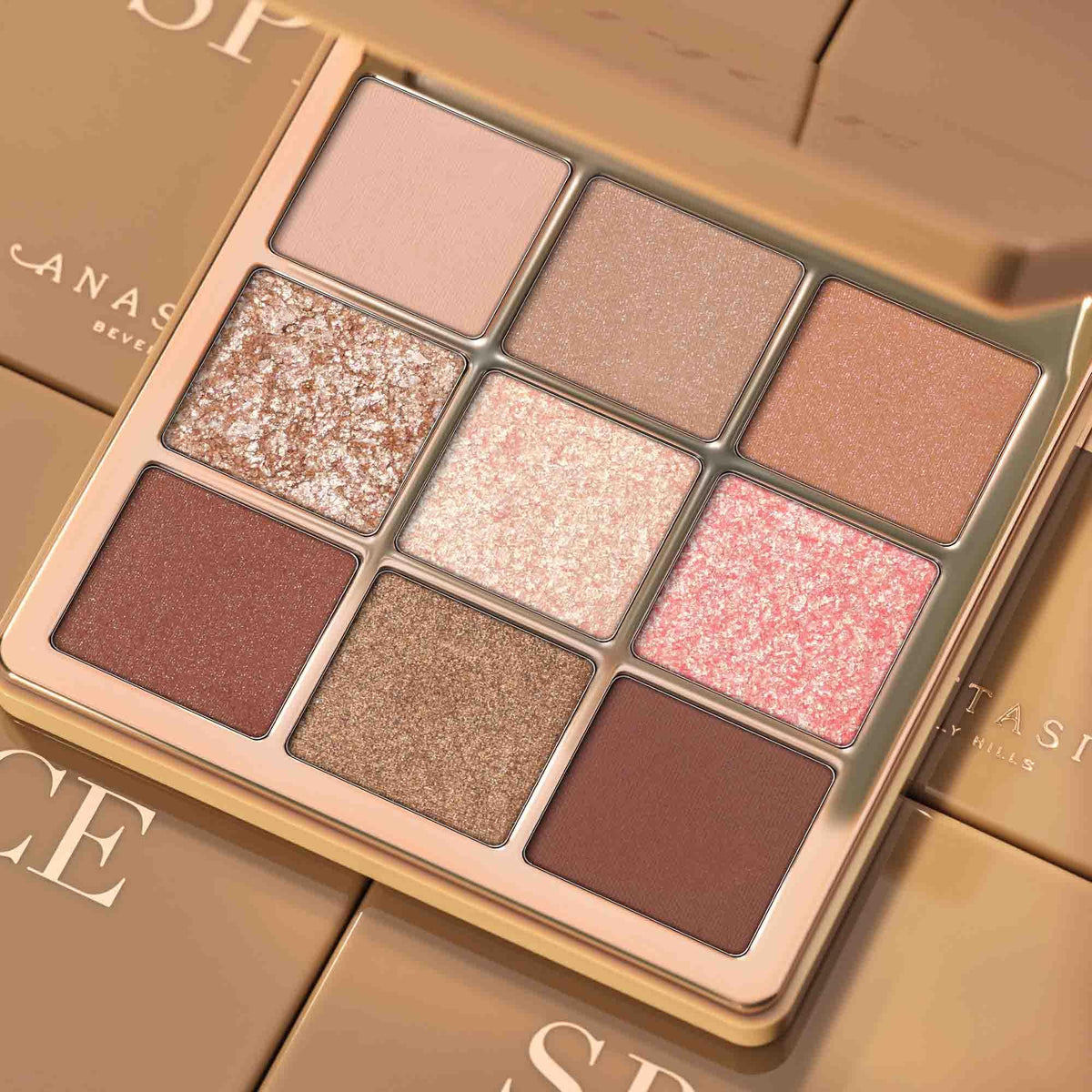 Anastasia Beverly Hills palette next to smartphone showing compact size and kit-friendly benefit