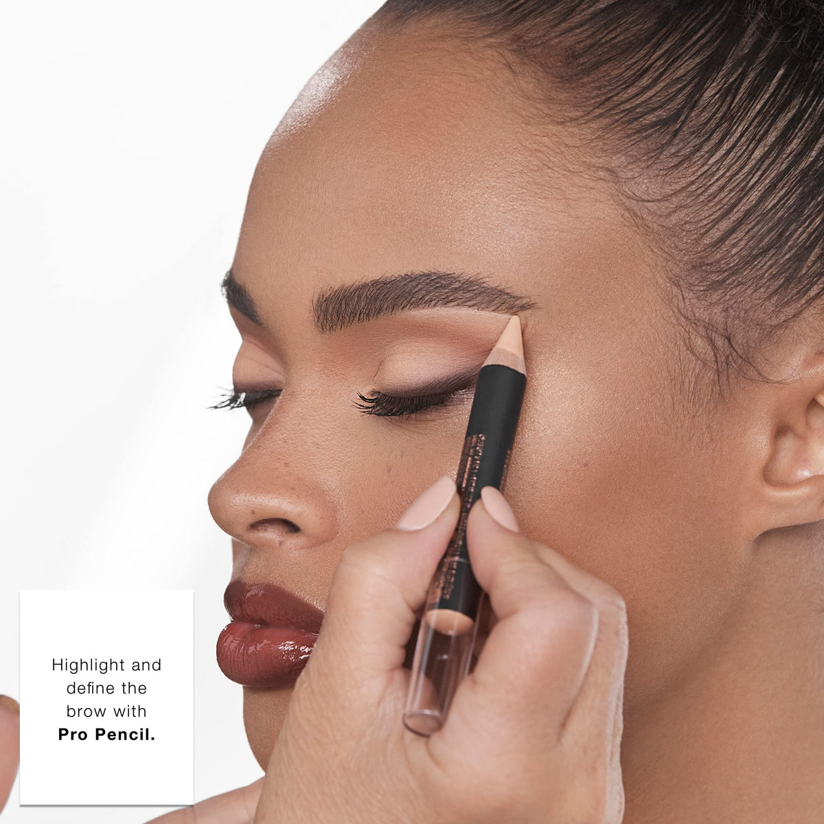 Anastasia Beverly Hills pro pencil applied under brow to lift and define arches for a cleaner shape