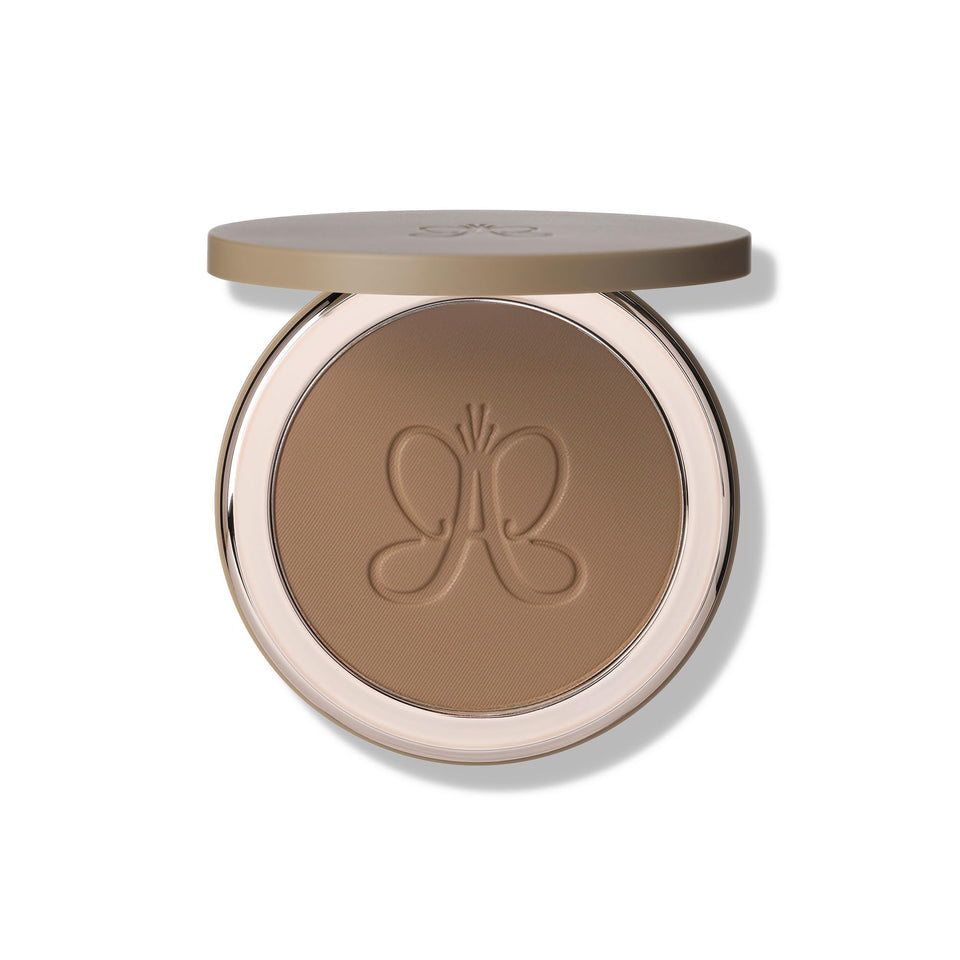 Anastasia Beverly Hills bronzer compact front view showing mirror and pan for travel-ready application