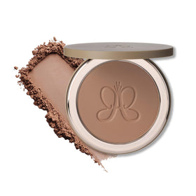 Anastasia Beverly Hills close-up of bronzer pan highlighting finely milled texture benefit