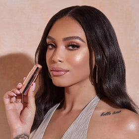 Anastasia Beverly Hills stick next to compact showing travel-friendly size