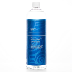 Refill bottle beside smaller spray container, refill saves packaging and cost