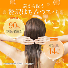 & Honey shampoo in hand during application showing gentle foam and cleanse
