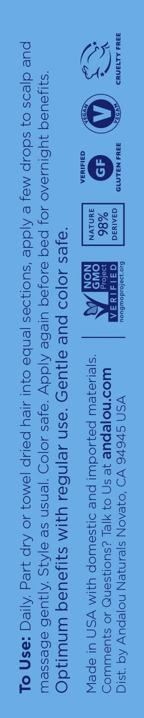 Andalou Naturals 2.1 oz bottle beside a ruler showing compact size