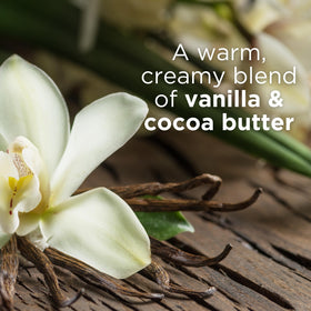 Andalou Naturals open jar with cream on a spoon demonstrating rich scoopable formula