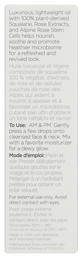 Andalou Naturals dropper dispensing oil highlighting silky texture