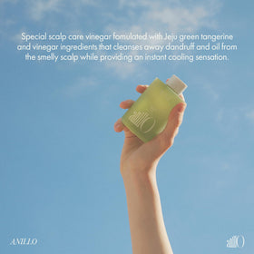 ANILLO bottle on bathroom shelf conveying fresh citrus scent and routine ease
