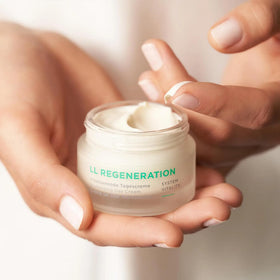 ANNEMARIE BÖRLIND applying cream to cheek demonstrating smooth absorption