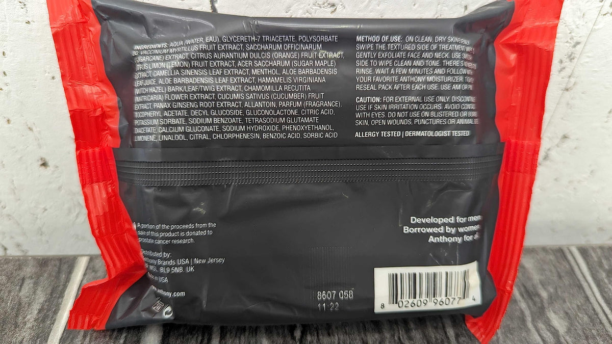 Anthony wipes on bathroom sink demonstrating easy daily skincare routine