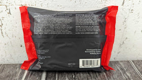 Anthony wipe next to a credit card showing compact size and travel convenience