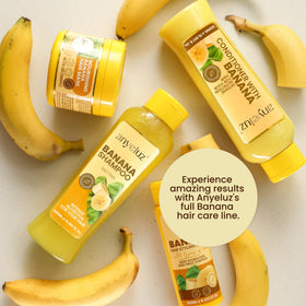 ANYELUZ bottle beside banana for scale to show product size