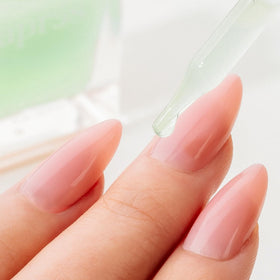 APRÉS close-up of serum texture, showing lightweight absorption and non-greasy feel