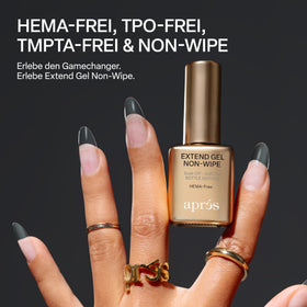 APRÉS cured nail close-up showing non‑wipe glossy finish resisting debris