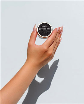 APRÉS at‑home nail station lifestyle shot showing salon results in a DIY setting