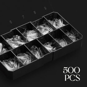 APRÉS stacked tips displaying almond shape for natural look