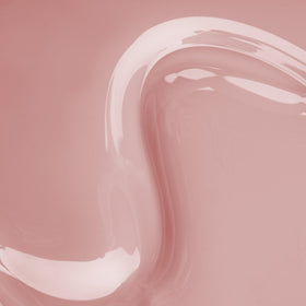 APRÉS swatch on natural nails displaying sheer finish and flattering spring pink tone
