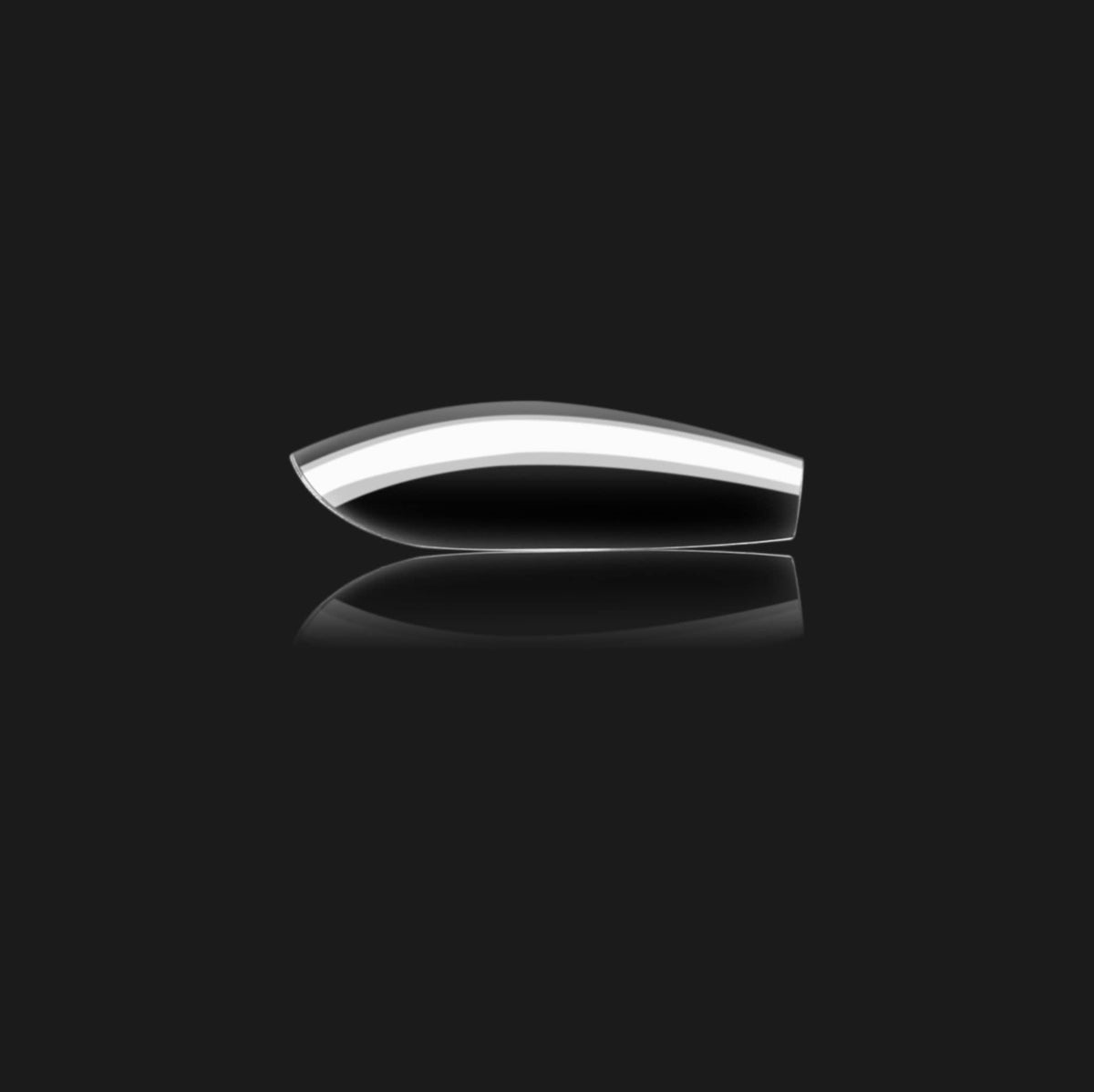 APRÉS coffin short tip next to finger showing scale and wearable length