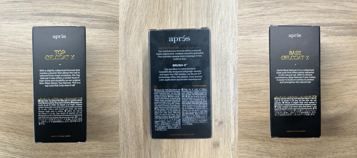 APRÉS bottles next to hand for size scale showing 15ml volume clarity benefit