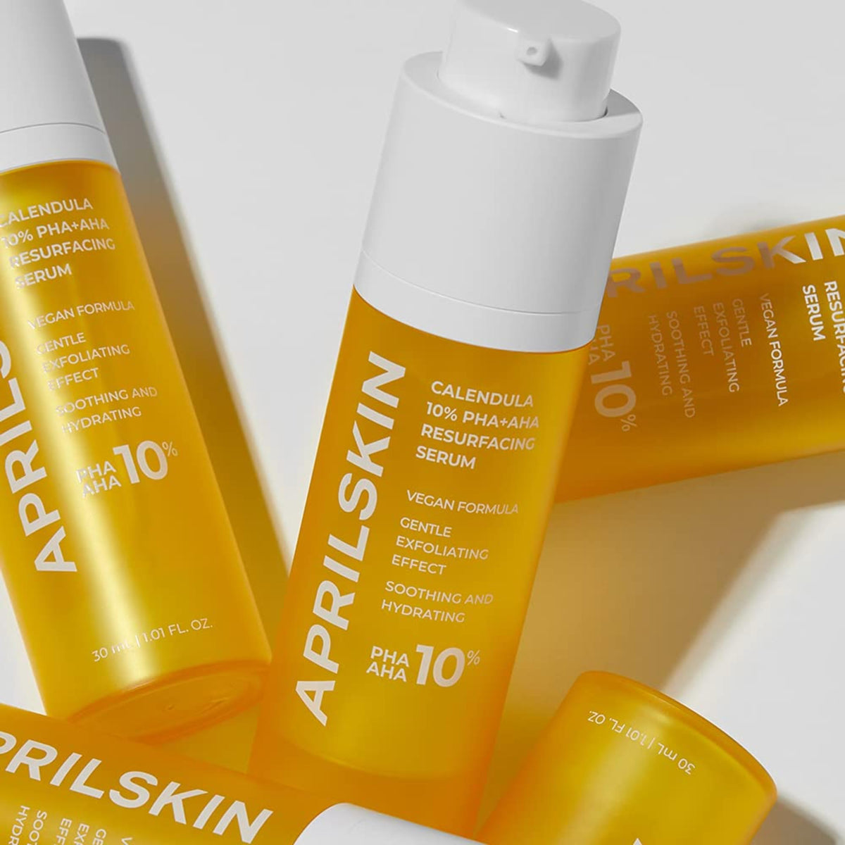 APRILSKIN product label detail showing calendula and acid blend benefits