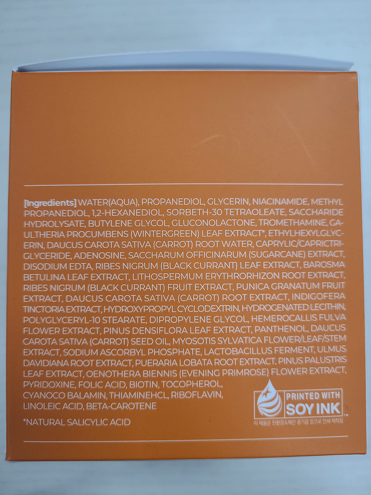APRILSKIN pad soaked with solution demonstrating ready-to-use convenience
