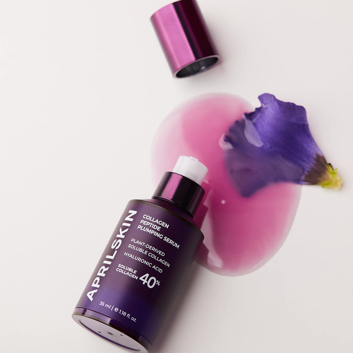 APRILSKIN clear gel serum on hand demonstrating lightweight, plumping effect