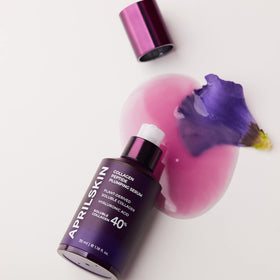 APRILSKIN clear gel serum on hand demonstrating lightweight, plumping effect