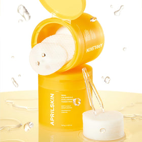 APRILSKIN open jar with visible soaked pads emphasizing hydration and ingredient clarity