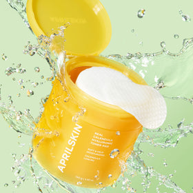 APRILSKIN pad held in hand to show scale and simple single-step skincare convenience