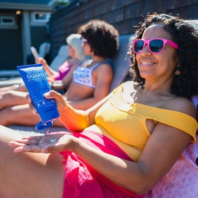 AQUA GUARD being applied to damp hair before swimming for defense