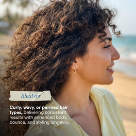 Aquage in-hands application illustrating even distribution and curl activation benefit