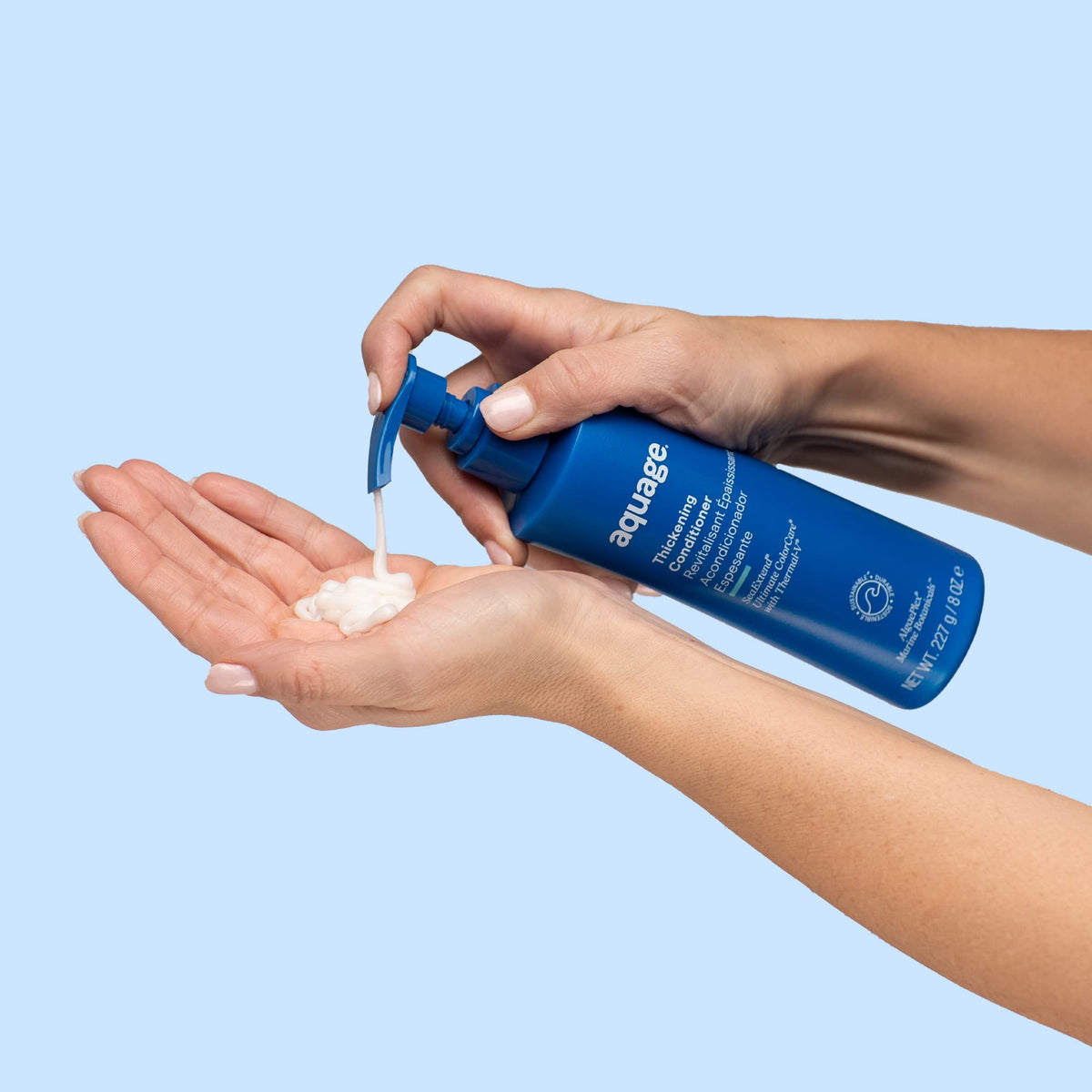 Aquage SeaExtend creamy conditioner in hair demonstrating soft lather