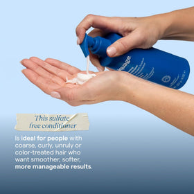 Aquage conditioner creamy texture swipe demonstrating smooth moisturizing formula