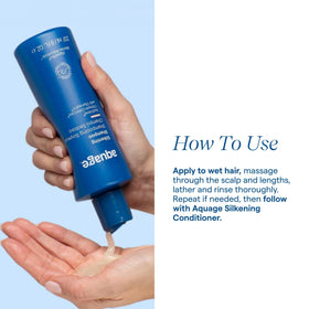 Aquage bottle held in hand showing 33.8 fl oz capacity benefit