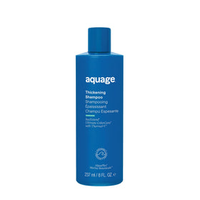 Aquage thickening shampoo front bottle showing label and volume, clear branding and benefit