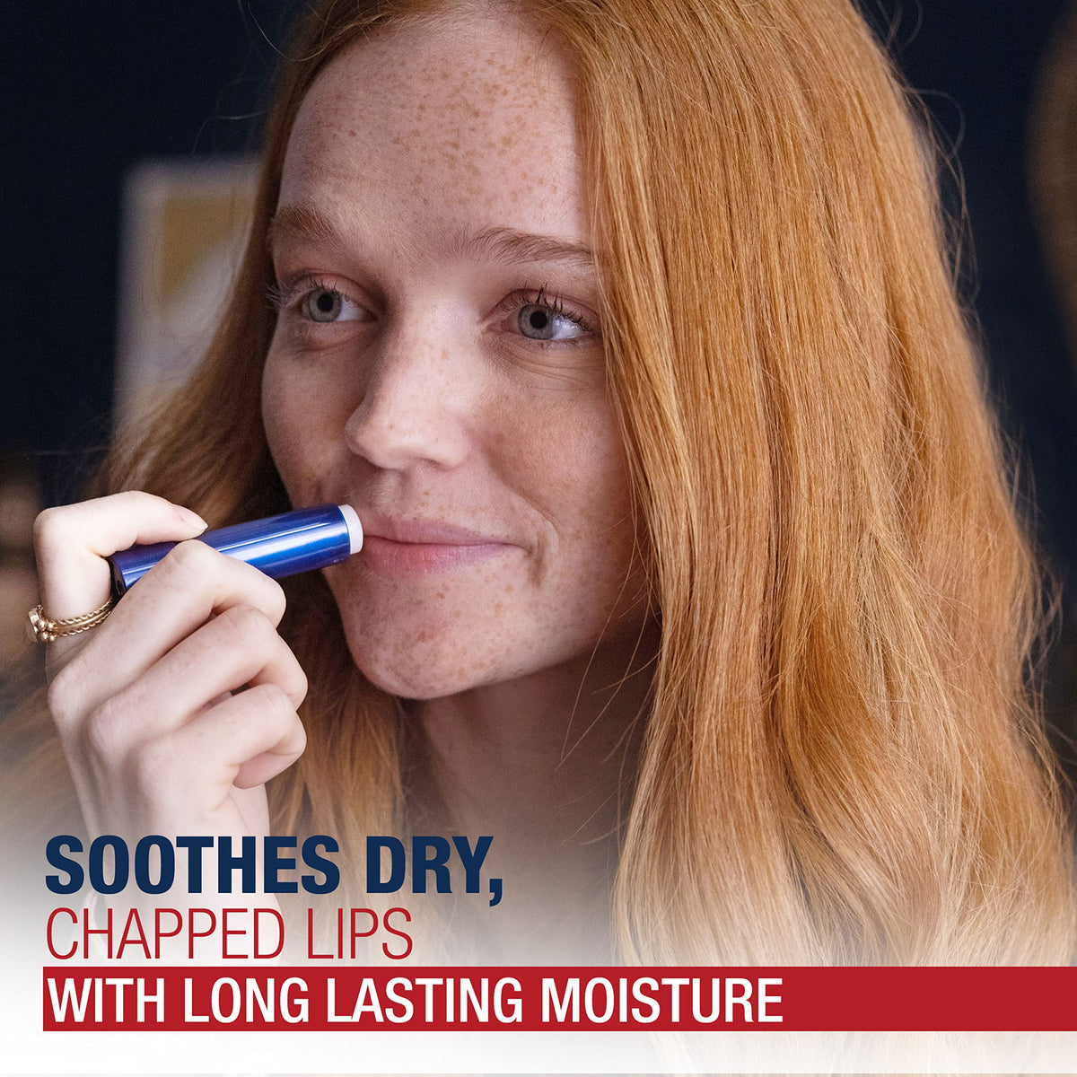 Aquaphor lip repair stick being applied to lips providing instant relief
