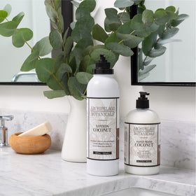 Archipelago Botanicals lotion being applied to leg offering visible hydration and comfort