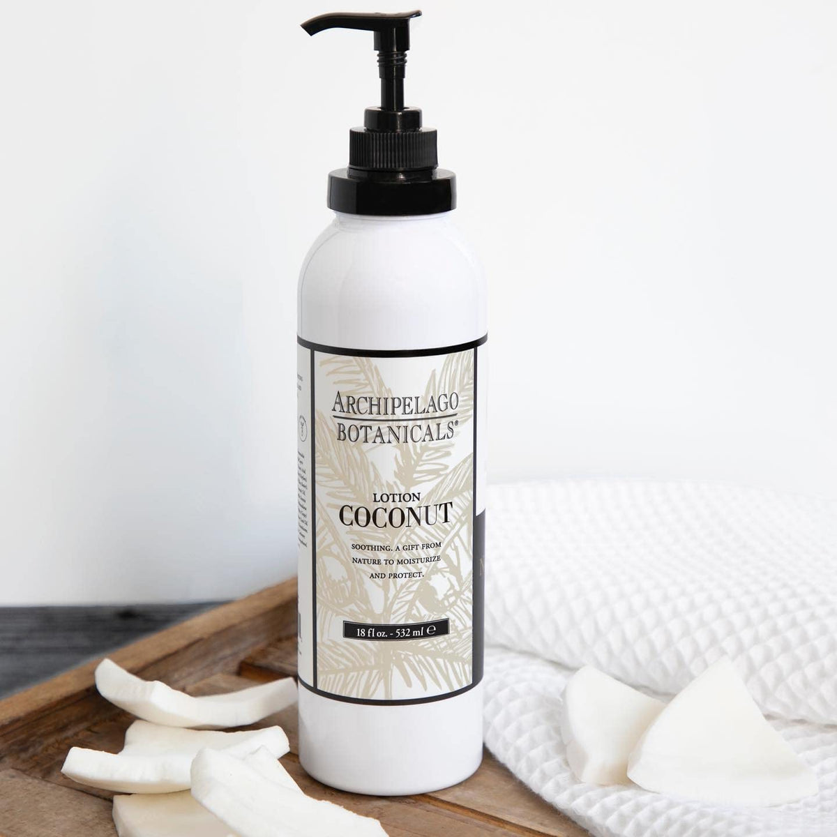 Archipelago Botanicals creamy lotion texture on hand illustrating smooth, fast absorption