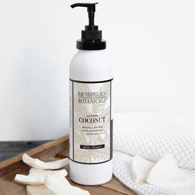 Archipelago Botanicals creamy lotion texture on hand illustrating smooth, fast absorption