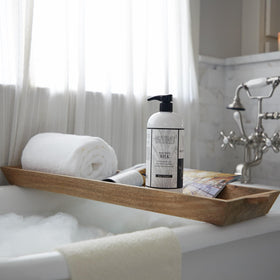 Archipelago Botanicals creamy lather on shower pouf for gentle cleansing