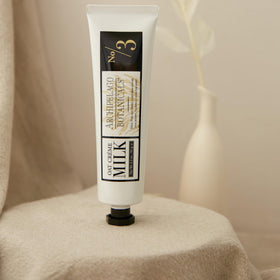 Archipelago Botanicals applying cream to hands demonstrating quick absorption benefit