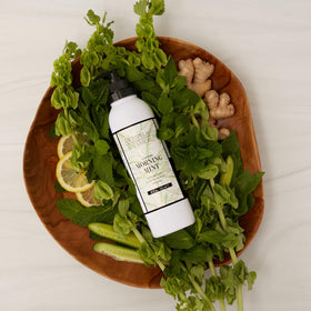 Archipelago Botanicals 18 oz bottle next to a ruler for size and value
