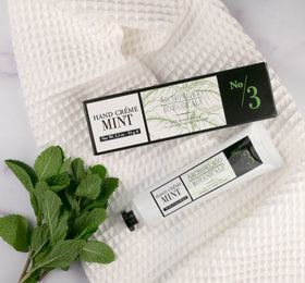 Archipelago Botanicals hand application demonstrating quick absorption and non-greasy feel