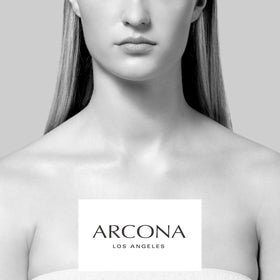ARCONA flat lay with pad, serum, and moisturizer showing layered routine