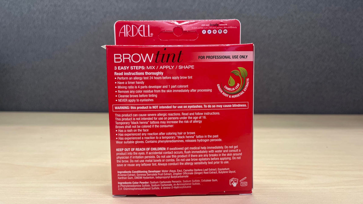 Ardell kit next to coin illustrating compact travel-friendly size